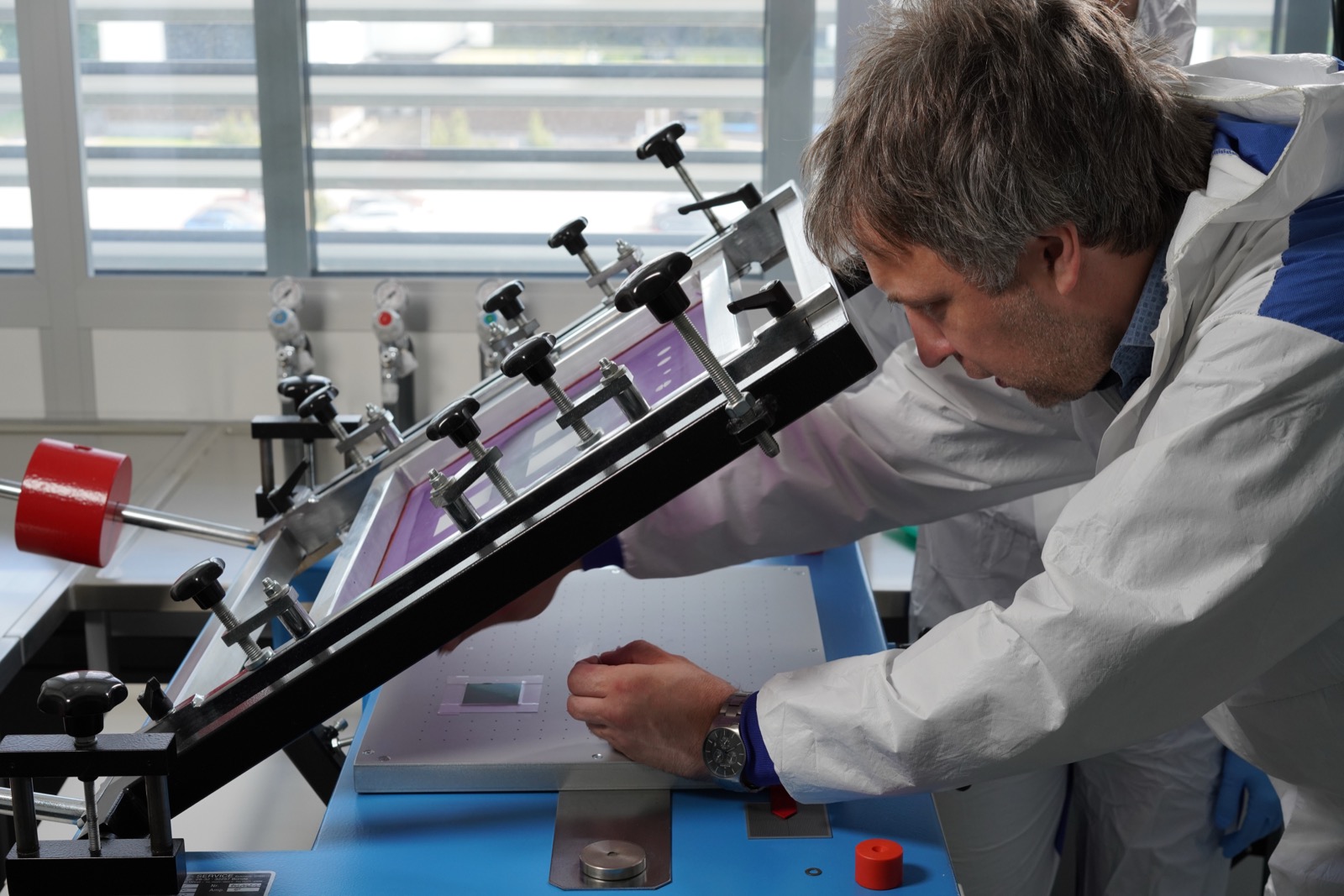 Screen-printing solid oxide fuel cell electrodes in a clean room